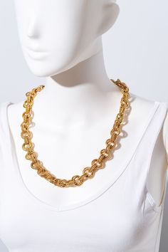 This is a bold vintage statement necklace by Monet. The necklace is chain link with varying details on each chain. The necklace closes with a hook and eye closure.  The necklace measures 24.5" long. The original Monet tag is attached! This piece will definitely turn heads! Look at how it sparkles!! For all vintage treasures: We love finding unique pieces for you, and we disclose as much detail as possible in our listings. However, since these are pre-loved items, occasional minor imperfections might go unnoticed. If you'd like more photos, specific measurements, or a video to ensure a perfect fit, feel free to contact us before buying! We offer first-come, first-served vintage finds. Additional Notes: Our smoke-free, pet-free environment ensures your treasures arrive fresh. While we use pr Vintage Gold Toggle Chain Necklace, Vintage Gold Metal Toggle Necklace, Vintage Gold-tone Oval Link Necklace, Vintage Snake Chain Necklace For Formal Occasions, Costume Jewelry Chain Necklace With Chunky Chain Link, Chunky Chain Link Necklace In Costume Jewelry, Vintage Chunky Chain Necklace As Gift, Vintage Style Chunky Chain Necklace As Gift, Chunky Chain Link Necklace Costume Jewelry