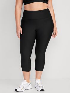 elasticized waist breathable go-dry wicks moisture sits at belly button fitted hits mid-calf 21" inseam models are approx.  5'9" and wear sizes s (4), l (12), and xl (18)machine wash according to the care instruction label Gym Bottoms With 4-way Stretch In Capri Length, Gym Capri-length Bottoms With 4-way Stretch, Gym Capri Bottoms With 4-way Stretch, 4-way Stretch Capri Bottoms For Gym, 4-way Stretch Capri Length Bottoms For Gym, Black Bottoms With Comfort Waistband For Pilates, Black Yoga Pants With 5-inch Inseam For Gym, Black Activewear With 5-inch Inseam And Comfort Stretch, Moisture-wicking Black Bottoms For Pilates