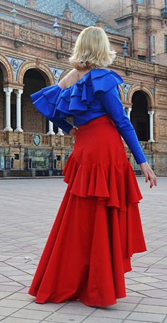 Red ruffled cotton skirt, cropped in front and with a long flared tail. Stylish, playful, versatile and fun, this red skirt will add a touch of Andalusian feeling to your wardrobe. A beautiful bouquet of red on flamenco rhythms, this playful ruffled skirt conquers the streets! High waisted, flared and extremely comfortable, this red skirt will definitely enliven your summer wardrobe! *new piece from the fresh ANDALUSIA collection Material: 95% cotton, 5% elastane Care instructions: Wash at 30 de Red Fitted Ruffled Skirt, Fitted Red Ruffled Skirt, Red Fitted Ruffle Skirt, Red Tiered Ruffled Mini Skirt, Red Ruffled Maxi Skirt For Spring, Spring Red Ruffled Maxi Skirt, Red Fitted Maxi Skirt With Ruffles, Spring Red Maxi Skirt With Ruffles, Red Summer Skirt With Attached Cancan