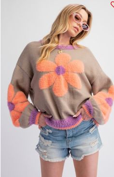 Introducing our Daisy Pattern Knitted Sweater PulloverTop. This stylish top features a unique daisy pattern detail on the sleeves and front, giving it a fresh and feminine look. With long sleeves, a rounded neckline, and a relaxed fit, it is both comfortable and stylish. Made from a soft blend of acrylic, nylon, and polyester, it is sure to keep you warm and cozy all day long. Perfect for any occasion. Cute Crew Neck Sweater For Spring, Retro Textured Knit Sweater For Spring, Retro Textured Knit Spring Sweater, Trendy Spring Crew Neck Sweater, Trendy Crew Neck Sweater For Spring, Trendy Floral Print Crew Neck Sweater, Cozy Crew Neck Sweater For Spring, Spring Soft Knit Crew Neck Sweater, Trendy Knit Tops With Floral Print