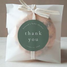 a thank you tag on top of a bag of cookies