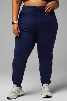 High-Waisted Performance Jogger Fabletics blue female Activewear >> Womens >> Bottoms >> Pants & Joggers >> Joggers PureLuxe Lite plus Everyday/Training 4-Way Stretch/Breathable/External Pocket/Moisture-Wicking/UPF Protection Jogger in ultra-soft PureLuxe Lite. Blue Stretch Joggers With Pockets, Comfort Stretch Joggers With Elastic Waistband, Ankle-length, Blue Sports Joggers With Elastic Side Panels, Blue Moisture-wicking Joggers For Training, 4-way Stretch Joggers With Pockets For Jogging, Drawstring Waist, Active Wear For Women, Bottoms Pants, Breathable Fabric