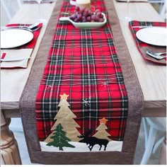 the table is decorated with plaid and trees