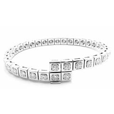 Authentic Cartier Tectonique 18k White Gold Diamond Tennis Bracelet       About Cartier: The company has a long and distinguished history of serving royalty, as well as stars and celebities. One Prince of Wales hailed Cartier as "Joaillier des Rois, Roi des Joailliers" (Jeweller to Kings, King of Jewellers"). Cartier received an order for 27 tiaras for the coronation of the future King. King Edward VII was crowned in 1902 and in 1904 he honoured the Company with the Royal warrant of supplier to Cartier Brilliant Cut Diamond Bracelet, Cartier Diamond Bracelet With Brilliant Cut, Cartier Fine Jewelry Diamond Bracelet With Brilliant Cut, Classic Cartier Bracelets For Wedding, Luxury Cartier Diamond Bracelet Brilliant Cut, Cartier White Gold Jubilee Bracelet, Luxury Cartier Brilliant Cut Bracelets, Luxury Cartier Diamond Bracelet With Brilliant Cut, Cartier Round Diamond Bracelet With Brilliant Cut