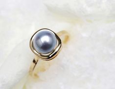 *Condition: Brand new *Center Stone: AAAA+ Madama Pearls 8-8.5mm or Akoya White Pink Pearl 8-8.5mm *Metal Purity: Can be select *superior pearls standard - 99% of the pearl surface is clean. An extremely detailed and up-close study of the pearl is needed to find imperfections. The item will be gift wrapped and shipped. --------------------------------------------------------- Available in : 14k Rose or Yellow Gold, White Gold 18k Rose or Yellow Gold, White Gold and Platinum ask us before you put Gold Pearl Ring With Halo For Gift, Gold Pearl Halo Ring Gift, Gold Halo Pearl Ring For Gift, Elegant Akoya Pearl Ring With Pearl Drop, Silver Akoya Pearl Ring With Pearl Drop, Luxury Akoya Pearl Ring In Pearl White, Luxury Pearl White Akoya Pearl Rings, Classic Adjustable Pearl White Pearl Ring, Pink Pearl Ring