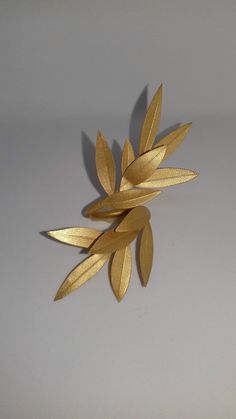 Dear All, Please note that we partnered with FedEx Couriers for all orders from USA. Therefore, when ordering please inform us at NOTES section or via email a valid contact number and email address. Beautiful handmade jewelry - piece of art - one of a kind Model : Physis - Gold Big Double Olive Leaves Ring BRASS/ gold-plated with a light brushed effect Handmade each leaf Ancient Greek Goddess olive wreath around the Finger! Looks stunning with any outfit and adds a touch of ethereal glamour! The Gold Leaf Jewelry, Olive Jewelry, Ancient Greek Goddess, Olive Leaf Ring, Wreath Ring, Ancient Greek Jewelry, Olive Wreath, Leaves Ring, Wreath Rings