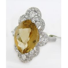 Karat : .925 Sterling Silver Gemstones : 1 Genuine Yellow Topaz - 6.81 Carats Yellow Topaz Grades, Hue . . . Yellow Tone . . . Medium Saturation . . . Vivid No Inclusions Or Flaws 56 Created White Sapphire - 0.02 Carats Each Net Weight : 5.6 Grams Shape : Round & Oval Type Of Setting : Prong Size : 7 Dimensions : 14 Mm X 10 Mm - Gemstone Measurements Ken And Dana Designs, Galaxy Ring, Yellow Tone, Stamped Rings, White Sapphire Ring, Blue Topaz Ring, Amethyst Stone, Diamond Sizes, Topaz Ring