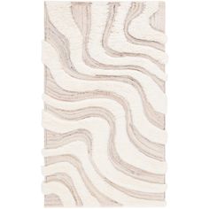 a white rug with wavy lines on it