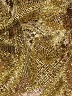 an image of a gold cloth textured with metallic foiling on the outside and inside