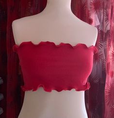 Hand-stitched bandeau crop top, in cotton (65%) and nylon (35%). Fast shipping (1 to 3 working days, and allow 4 to 14 working days for delivery). Solid Fitted Cropped Tube Top, Stretch Ruffled Crop Top, Stretch Crop Top With Ruffles, Stretch Ruffled Cropped Crop Top, Stretch Strapless Crop Top For Summer, Fitted Solid Color Bandeau Crop Top, Fitted Solid Bandeau Crop Top, Trendy Fitted Bandeau Crop Top, Fitted Bandeau Crop Top With Ruffles