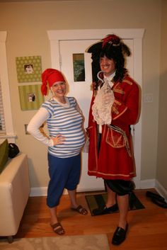 two people in costumes standing next to each other