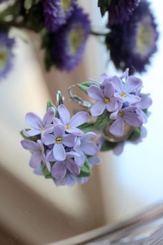 These exquisite handmade lavender flower earrings bring a touch of nature's elegance to your style. Delicately crafted from polymer clay, each earring showcases intricate details, capturing the beauty of fresh lavender blooms. These earrings are perfect for adding a soft, feminine touch to any outfit, whether you're dressing up for a special occasion or adding a hint of nature to your everyday look. Ideal for weddings, romantic dates, or as a thoughtful gift for someone special. Specifications: Material: Polymer clay Color: Lavender, green Size: Flower diameter 3 cm Closure Type: Leverback (French clip) Handmade: Yes Care instructions: 1. Use hardware to put on( don't push on petals on the edge). 2. Don't wet and try to avoid any water contact Gift Ideas: These earrings make a perfect gift Elegant Purple Flower Earrings With Handmade Flowers, Elegant Purple Handmade Flower Earrings, Handmade Lavender Flower Drop Earrings, Purple Flower-shaped Polymer Clay Earrings, Elegant Lavender Flower Earrings With Ear Wire, Lavender Flower Earrings With Ear Wire, Handmade Lavender Flower Earrings, Handmade Purple Polymer Clay Flower Earrings, Elegant Purple Polymer Clay Earrings