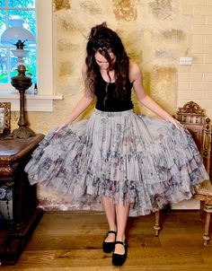 This amazing tulle tutu skirt is designed so you can wear the high low either in the front ( short in the front long at the back ) or on the side with the shorter length at the side  The skirt can also be worn as a dress by pulling it up on top of the bust . The elastic is very soft and comfortable but firm holding it up in place should you want to wear it as a dress .  It's lined to the knee and has the most fantastic profile , so so full of delicious floral tulle in a beautiful seafoam pale rose bouquet floral tulle .  This beautiful Ballerina tutu can be worn Winter ( with boots , leggings , sweater ) or in the warmer months with sandals and a shirt cropped top or blouse one size .. it's very generous and will fit a petite figure like our model up to a size 18 Boots Leggings, Ballerina Tutu, Tulle Tutu Skirt, Tulle Tutu, Tutu Skirt, Rose Bouquet, The Knee, High & Low, High Low