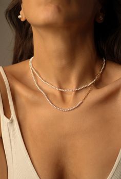 "Tiny Pearl Necklace Simple and feminine!  This timeless classic piece can perfectly be layered with other necklaces or pendants. A great gift for yourself or a loved one. Pearl necklace style: ♦️ natural freshwater pearl choker 16\"+2\" extender chain ♦️ half pearl necklace 16\"+2\" extender chain Details: * Pearl size: around 3mm  * Material: natural white freshwater pearls, 18k PVD gold-coated over stainless steel * Length:16\"+2\" chain extender  waterproof, hypoallergenic, nickel-free, grea Elegant Paperclip Chain Jewelry As A Gift, Elegant Paperclip Chain Jewelry For Gifts, Elegant Paperclip Chain Jewelry Gift, Elegant Everyday White Layered Necklace, Everyday Elegant Layered Chain Necklace, Elegant White Layered Necklace For Everyday, White Elegant Layered Necklace For Everyday, White Layered Pearl Chain Necklace As Gift, White Pearl Chain Layered Necklace As Gift