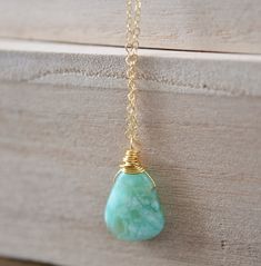 This stunning necklace is handmade with gorgeous specimens of natural Chrysoprase. This gem, also known as green Chalcedony, is said to promote joy and happiness, as well as attract love and prosperity. No two pendants are the same. Some are minty green, while others have flecks of brown, white, or black within them. The chains are sterling silver or 14k gold filled. So go ahead, flaunt your unique style! GEMSTONE: Chrysoprase STONE SIZE: 20 to 32mm (.78 to 1.25") STONE SHAPE: Irregular Smooth P Minimalist Green Necklaces With Natural Stones, Minimalist Handmade Jade Necklace, Handmade Minimalist Jade Necklace, Handmade Green Amazonite Jewelry, Green Amazonite Jewelry As A Gift, Chrysoprase Gemstone Beads Necklace For Gift, Green Amazonite Jewelry Gift, Gold Chrysoprase Pendant Necklace, Gold Chrysoprase Necklaces As A Gift