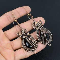 Use 70FORYOU Coupon Code For Get 70% Off On All Items  Handmade Copper Chain Size 18-20Inch - https://www.etsy.com/in-en/listing/1162990726 Welcome to our little shop, where you can find handmade copper wire jewelry and more, for you and your loved ones. We do accept custom orders also, kindly message us for more. Black Onyx Gemstone Copper Wire Wrapped Handmade Earrings Gemstone : Black Onyx  Earrings length : 10.1 Cm Metal : Copper  * Protection:- Copper will be tarnished after a while so try to limit contact with lotions, soaps or anything moist and never wear it in the shower, swimming or anywhere else it may come in contact with water. If tarnish becomes an issue, you may clean this item with jewelry cleaning cloth or ultra polishing pads. * Packing:- Your jewelry arrived in a beautif Wire Wrapped Metal Drop Earrings, Black Bohemian Teardrop Earrings As Gift, Black Bohemian Teardrop Earrings For Gift, Bohemian Black Teardrop Earrings As Gift, Handmade Black Bohemian Teardrop Earrings, Black Bohemian Teardrop Dangle Earrings, Black Bohemian Earrings With Ear Wire, Black Copper Dangle Earrings, Black Bohemian Drop Earrings