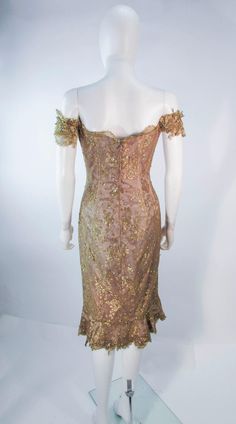 MANDALAY Gold Sequin Beaded Lace Cocktail Dress Size 4 For Sale at 1stDibs | mandalay dress, mandalay dresses, gold lace cocktail dress Gold Off-shoulder Evening Dress, Gold Dresses With Sequins And Fitted Bodice, Gold Sequin Dress With Fitted Bodice, Gold Sequined Dress With Fitted Bodice, Luxury Fitted Sequin Mother Of The Bride Dress, Fitted Sequin Mother Of The Bride Dress For Gala, Luxury Fitted Mother Of The Bride Dress With Sequins, Gold Fitted Evening Dress For Gala, Fitted Gold Evening Dress For Gala