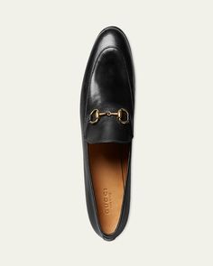 Gucci calfskin leather loafer. 0.5" flat heel. Apron toe. Rounded vamp. Golden bitstrap detail. Smooth outsole. Slipon style. "Jordaan" is made in Italy. Gucci Leather Loafers With Rubber Sole, Gucci Leather Loafers With Leather Footbed, Gucci Calf Leather Shoes With Leather Sole, Gucci Leather Shoes With Calf Leather Sole, Gucci Calf Leather Loafers With Rubber Sole, Gucci Leather Tassel Loafers With Round Toe, Gucci Luxury Loafers With Leather Lining, Gucci Calf Leather Dress Shoes With Leather Sole, Gucci Dress Shoes With Leather Sole And Calf Leather