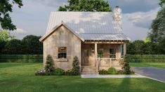 a small wooden house sitting on top of a lush green field