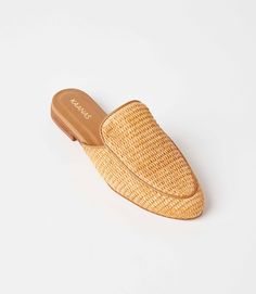 Designed for effortless elegance, these mules feature a chic woven raffia construction that exudes natural charm and sunny-day vibes. The sleek apron toe adds a touch of refinement, while the low, walkable heel ensures comfort and ease with every step without sacrificing style. Upper: 90% Synthetic, 10% Bovine leather Leather lining & inner sole Imported Narrow width - True to size; for half sizes, we recommend ordering a full-size up | Karen Kane Basketweave Mules in Caramel, Size 10, Plain Chic Natural Mules For Spring, Chic Natural Color Spring Mules, Woven Mules For Summer, Chic Woven Mules For The Beach, Chic Woven Mules For Beach, Chic Straw Mules For Spring, Natural Straw Mules, Chic Beige Woven Mules, Chic Straw Mules For Vacation