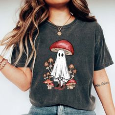 Halloween Sweater, Funny Mushroom Shirts, Cottagecore Shirt, Magic Mushroom Shirt, Halloween Vintage Shirt, Botanical Shirt, Cute Fungi Tee  📢Please Check All Photos For Details.   📢Choose Your T-Shirt Size From The Drop-Down Lists Next To The item Picture   📢Choose Of Your T-Shirt Color From The 2nd Picture   📢Use "Add message to Seller" link On The Checkout Page To Send me the Following important Details For Your Order's Customization.   📢Shipping Time Varies by location (we are located i Cat And Mushroom, Mushroom Shirts, Cottagecore Tshirt, Mushroom Outfit, Cat Mushroom, Mushroom Tshirt, Funny Mushroom, Mushroom Shirt, Floral Shirts