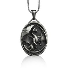 Dragon oval pendant necklace in sterling silver, Personalized fantasy necklace for best friend, Birthday gift necklace These 925K Sterling Silver Dragon with Open Wings Necklace has special handmade engraving details which photos are taken with original products. It's very elegant and classy for everyday use and gives stylish look to your outfits. Also, can be preferred as a gift for friends and family for an eternal memorial. Dream collection has many meanings behind its background; we prepare Fantasy Silver Necklace With Round Pendant, Fantasy Silver Round Pendant Necklace, Silver Round Pendant Necklace In Fantasy Style, Fantasy Style Engraved Necklaces For Gifts, Silver Fantasy Necklace For Gifts, Fantasy Style Silver Necklaces As A Gift, Fantasy Style Silver Necklaces For Gifts, Fantasy Style Engraved Necklace For Gift, Fantasy Style Silver Necklace As Gift