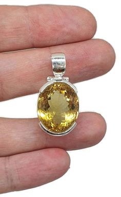 Citrine Pendant, Sterling Silver, 21 carats, Oval Faceted, November Birthstone, Money Stone, Success Stone, Stone of Abundance, Genuine Gem This Divine oval shaped Citrine Pendant makes a great gift for any Anniversary, Birthday, Holiday or Special Occasion 💛 21 carats of Fiery Citrine Half Bezel set in 925 Sterling Silver (stamped 925 & GA for Gemz Australia) Length 35 mm Gemstone measures 22 mm by 16 mm, 12 mm deep 11.9 grams November Birthstone * chain sold separately * Pick up South Brisban Exquisite Oval Gemstones For Formal Occasions, Exquisite Oval Gemstones For Formal Events, Luxury Oval Diamond Cut Gemstones, Oval Diamond-cut Gemstones For Formal Occasions, Elegant Yellow Faceted Gemstones, Formal Oval Diamond-cut Gemstones, Oval Gemstones For Formal Occasions, Formal Oval Gemstones, Oval Faceted Gemstones For Fine Jewelry