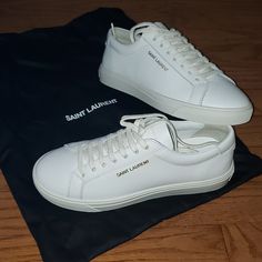 Nwt Saint Laurent Andy Sneakers In Color 'Optic White'. Never Worn. Size Eur 35, Fits Women's Size 5 Or Even 5.5. Selling Because I Find It A Little Too Big For Me. Comes With The Box, Extra Shoelaces, Booklet, And A Dustbag For Each Sneaker. Any Questions Let Me Know! Luxury Custom Sneakers With Vulcanized Sole, Elegant Lace-up Sneakers With White Sole, Designer Low-top Custom Sneakers With Vulcanized Sole, Designer Custom Sneakers With Vulcanized Sole, Elegant Low-top Leather Sole Sneakers, Elegant Low-top Sneakers With Leather Sole, Elegant Low-top Sneakers With Perforated Toe Box, Elegant White Sneakers With Rubber Sole, Designer Custom Low-top Sneakers, Medium Fit