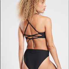 Athleta D-Dd Triangle Bikini Top Swim | Black Small #511644 New With Tags Fully Adjustable Removable Pads For: Swim, Surf, Stand-Up Paddleboard And All Water Sports Feel; Recycled H:Eco Swim Fabric Is Sleek With Powerful Stretch Fave: Back Ties For Adjustability And Feminine Strappy Detail #511644 Fabric + Care Recycled Nylon, Lycra Rated Upf 50+ Quick-Drying Lycra Xtra Life Spandex Machine Wash And Line Dry. ***Inner Label Is Marked To Prevent Store Return Sports Halter Neck Tankini With Built-in Bra, Athleisure Swimwear With Built-in Bra For Gym, Sporty Seamless T-back Swimwear, Black Triangle Top Sports Bra With Built-in Bra, Black Sports Swimwear With Built-in Bra, Sports Tankini With Built-in Bra And Triangle Top, Athleisure T-back Swimwear, Bra Friendly, Sports Tankini With Built-in Padding, Sporty Halter Neck Swimwear With Built-in Bra