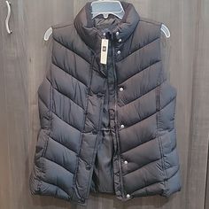 Gap Vest With Buttons And Zip Has Pockets.. Black Gap Outerwear For Work, Gap Black Winter Outerwear, Gap Black Spring Outerwear, Black Gap Outerwear For Spring, Gap Casual Black Outerwear, Spring Black Outerwear By Gap, Casual Black Gap Outerwear, Fall Puffer Vest, Vest With Buttons