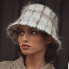 The bucket hat is now the modern classic. It ticks every box: it is really easy to wear, looks good with anything, is stylish without being at all pretentious, and depending on the material can be very casual or more elegant. This version is definitely elegant, a beautifully soft mohair that makes this style into something utterly gorgeous. 78% mohair 16% wool 6 % nylon lining 100% cotton Dry clean only Womens Hats, Brand Magazine, August Birthstone Jewelry, July Birthstone Jewelry, Artisan Gift, Gifts For New Mums, Jewelry Ring Box, Pearl Jewellery Earrings, Beautiful Hats