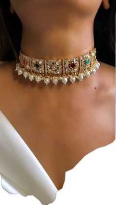 Festive Crystal Jeweled Necklaces, White Jeweled Necklaces For Festivals, White Jeweled Necklace For Festivals, Bollywood Style Gold Jeweled Choker, Bollywood Gold Jeweled Choker, Gold Jeweled Bollywood Choker, Jeweled Choker Necklaces For Celebration, Traditional Jeweled Crystal Necklaces, Traditional Crystal Jeweled Necklaces