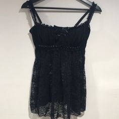 Fredericks Of Hollywood Black Babydoll Black Sequins Adjustable Straps And Back Has Underwire Nwot Black Lace Camisole In Flirty Style, Black Lace Camisole In Feminine Style, Black Lace Coquette Camisole, Black Sleeveless Coquette Camisole, Black Coquette Sleeveless Camisole, Black Coquette Camisole Top, Black Tops With Built-in Bra Coquette Style, Black Coquette Top With Built-in Bra, Black Babydoll