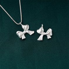 Sterling Silver Bowtie Charm Pendant, Ribbon Bracelet, Bow Necklace, Girly Earring, Small Charm, Bowknot Jewelry, Butterfly Bow Charm material：925 silver size : width 12mm, height 12.7mm, thickness 3.9mm, ring hole 1.4mm, approx. 0.77g Valentine's Day Bow Jewelry Gift, Cute Bow Jewelry For Valentine's Day, Silver Ribbon Jewelry For Valentine's Day, Valentine's Day Silver Ribbon Jewelry, Silver Butterfly Knot Jewelry For Party, Silver Jewelry With Butterfly Knot For Party, Cute Butterfly Knot Jewelry For Parties, Adjustable Ribbon Jewelry For Valentine's Day, Bow Pendant Jewelry For Gifts