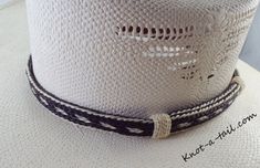 this horsehair hat band is a Bolder hat band done in black and white horsehair. 100% all natural horsehair. Everything you have been looking for in a Horsehair hat band. Distinctive look, uncompromising quality, and a unique design. * This is a 5 strand horsehair hat and that is about 5/8 inches wide.. You will find it easy to adjust to fit most any size hat with the two sliding knots. Brings out your spirit in an exclusive design that is vibrant as your western lifestyle. MEASUREMENTS * Longest Custom Handmade Black Hat Bands, Southwestern Black Hat Bands For Country Events, White Southwestern Hat For Country Events, White Southwestern Hat Bands For Country Events, Southwestern White Adjustable Hat, White Southwestern Adjustable Hat, Adjustable White Southwestern Hat, White Southwestern Hat Bands For The Beach, Handmade Black Hat Bands For Country Events