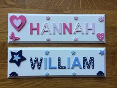 two name plates with hearts and stars on them