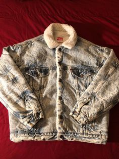 Vintage 80s - Levi's Acid Wash Denim Sherpa Lined Trucker Jacket - Made In USA - Size L Good preowned condition. The jacket shows wear and fading. There are some light stains on the front and back of the jacket. The jacket shows fraying along some of the seams. Please refer to the photos Acid Wash Denim, Sherpa Jacket, Alternative Rock, Trucker Jacket, Light Stain, Sherpa Lined, 1980s Vintage, Acid Wash, Denim Wash