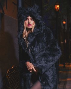 Women's Faux Fur Coat - Classic This Faux Fur Coat for Women in Black Wolf features an oversized hood with ears, gorgeous custom Wolf buttons, and cozy pockets. This shaggy faux fur is perfect for everyday wear or dressing up for a night out on the town. Black Wolf Characteristics LOYALTY – CONFIDENCE – WISDOMThe Black Wolf is a mystery with inner wisdom that reaches far beyond its years. This spirit has a gift for communication and can often be heard howling the music of the wild. A Black Wolf Wolf Characteristics, Faux Fur Coat Black, Love In Black, Womens Faux Fur Coat, Coat Classic, Black Faux Fur Coat, Faux Fur Coats, Inner Wisdom, Latest Instagram