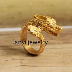 Dragon ring, animal ring , boho ring ,ring for gift , promise ring, handmade jewelry, Unique Ring, brass ring, gift idea, Animal lover Gemstone - Na Jewelery Category:- Handmade Ring Metal:-Brass -- T H E * Q U A L I T Y We buy raw gemstones directly from miners and then get them cut and polished at our workshop , Therefore saving some bucks (additional added fees and markups) avoiding a middle man and making sure of the authenticity of the gems. And we use top quality materials that are water s Symbolic Rings With Unique Design For Gift, Unique Open Brass Ring, Unique Hand Cast Snake Ring Gift, Unique Hand Cast Snake Ring As Gift, Unique Brass Rings, Handmade Spiritual Midi Rings, Unique Brass Midi Rings, Symbolic Adjustable Snake Ring Gift, Adjustable Symbolic Snake Ring Gift