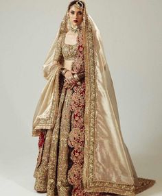 a woman in a bridal gown and veil