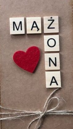 some type of greeting card with the word mazonna written on it and a red heart