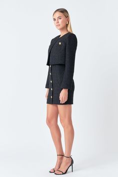 Get ready to elevate your wardrobe with our must-have Cropped Buttoned Tweed Jacket. Made from high-quality tweed fabric this jacket exudes sophistication and style. The cropped length adds a modern twist to the classic tweed design making it perfect for pairing with high-waisted jeans or skirts. The front buttons add a touch of elegance while the front pockets add a functional and chic detail. Available in multiple sizes and flattering colors this jacket is a versatile addition to any wardrobe. Chic Fitted Tweed Cropped Jacket, Elegant Cropped Fitted Tweed Jacket, Elegant Cropped Tweed Jacket For Formal Occasions, Elegant Fitted Tweed Cropped Jacket, Fitted Cropped Tweed Jacket For Fall, Tailored Cropped Tweed Jacket For Fall, Tailored Cropped Tweed Jacket For Work, Cropped Tweed Jacket For Work, Chic Cropped Tweed Jacket