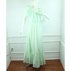 Vintage Handmade Maxi Dress. It Is Made With Mint Green Embroidered Eyelet Fabric. The Dress Has A Structured Bodice With An Oversize Eyelet Ruffle Across The Top. It Has A Decorative Waist Tie, The Waist Of The Dress Is Not Loose So It Is More For Show To Make A Bow. It Has A Full Skirt. There Is A Small Area Of Staining On The Back Of The Skirt. I Am Estimating It To Fit An Xs. It Is Shown On An Xs Mannequin And It Fits The Mannequin Well. The Dress Is Woven Cotton And Does Not Stretch. Please See All Photos For Condition And Check The Measurements For Size. Sleeve/Ruffle 9 1/2" Chest Approximately 34" Waist 28" Hip 52" Length 56" 108 Make A Bow, Eyelet Fabric, Woven Cotton, Dress 100, How To Make Bows, Full Skirt, Dress Clothes For Women, Ruffle Dress, Waist Tie