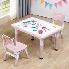 a child's table and chair set up for play