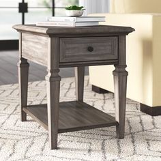 an end table with a book on top