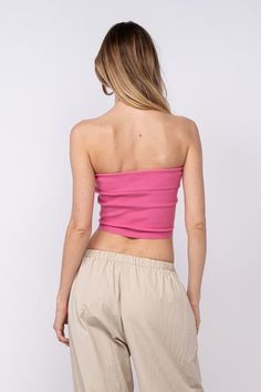 You deserve some extra attention in the Ashley Pink Ribbed Tube Top! Cute ribbed knit tube top with overlaped straight neckline and cropped bodice. Style with distressed high-waisted shorts for a fun vacation look! DETAILS & CARE 50% Viscose, 28% Polyester, 22% Nylon. Hand Wash Cold. Imported. Seamless Short Length Crop Top For Summer, Casual Short-length Tube Top For Summer, Casual Short Length Tube Top For Summer, Trendy Seamless Spring Shorts, Trendy Ribbed Tube Top For Summer, Trendy Ribbed Tube Top For Spring, Trendy Short Length Ribbed Top, Trendy Ribbed Short-length Top, Trendy Short Length Tops For Beach Season