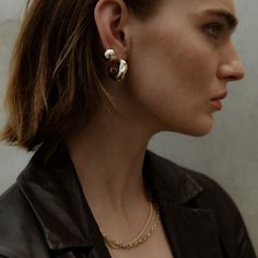 The Hammered Chubby Hoops are the perfect statement hoop to wear all day, with any outfit. These hoop earrings are minimalist enough to wear everyday, while also being eye catching to wear as a statement piece. Wear the Hammered Chubby Hoops with other designs from our F+H Earring Collection. DETAILS: High micron, ethically sourced 18K gold plating certified by LBMA Responsible Gold to meet international ethics standards. Eco brass base metal with premium gold or sterling silver plating. Nickel Versatile Everyday Hoop Earrings, Modern Metal Huggie Earrings For Everyday, Small Hoop Huggie Earrings For Everyday Elegance, Chic Hoop Earrings For Everyday Elegance, Chic Small Hoop Earrings For Everyday Elegance, Chic Everyday Hoop Earrings, Minimalist Jewelry For Work, Minimalist Metal Hoop Earrings For Everyday, Modern Hoop Earrings For Everyday