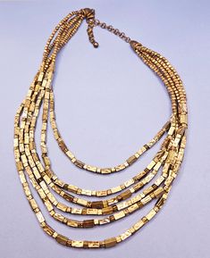 Very beautiful vintage multi strand goldtoned necklace by Chico's! Gold Bib Necklace Costume Jewelry, Adjustable Gold Multi-strand Jewelry, Adjustable Multi-strand Gold Jewelry, Gold Costume Jewelry Bib Necklace, Adjustable Multi-strand Layered Necklace, Multi-strand Gold Beads Costume Jewelry, Gold Multi-strand Layered Beaded Necklaces, Gold Layered Multi-strand Beaded Necklaces, Gold Layered Double Strand Beaded Necklaces