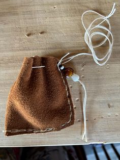 Small leather medicine pouch or gemstone bag with mushroom bead. Medicine Bag Necklace, Leather Medicine Pouch, Pouch Drawstring, Bag Necklace, Medicine Pouch, Necklace Leather, Medicine Bag, Backpack Purse, Medicine