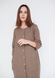 "The Elena is a casual, all-season dress with three-quarter sleeves and a button closure, making this dress functional and nursing-friendly. It is a great pick for those days when all that matters is how to get most of the day. This garment is true to size, and we recommend choosing the size you usually wear. If you want the garment to be loose-fitting, choose a larger size than you usually wear. Before placing an order, check the approximate measurements of the finished garment given below. Mod Linen Button-up Dress With Buttons, Brown Linen Long Sleeve Dress, Linen Button-up Midi Dress, Button-up Linen Midi Dress, Beige Linen Dress With Buttons, Relaxed Fit Linen Dress With Button Cuffs, Beige Linen Shirt Dress With Button Closure, Fall Linen Midi Dress With Buttons, Fall Linen Button-up Dress